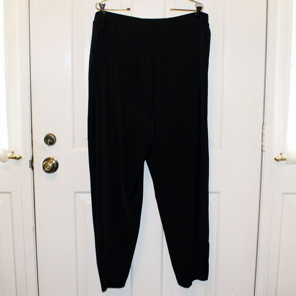 Susan Graver 1X black Liquid Knit Pants with three oval brass grommets on each l